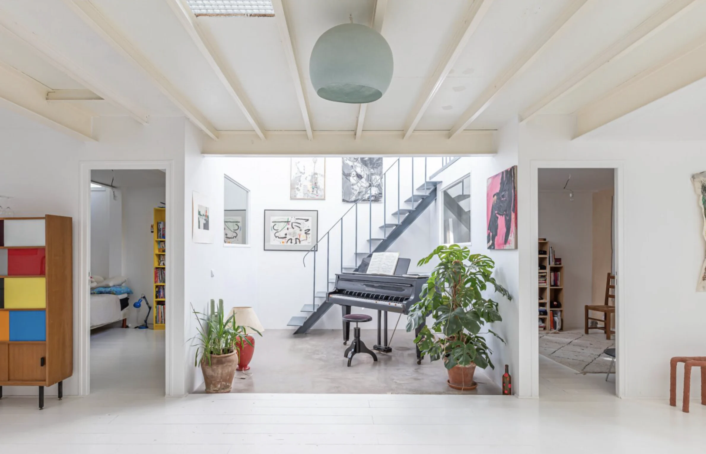 Light-filled white loft in a former factory